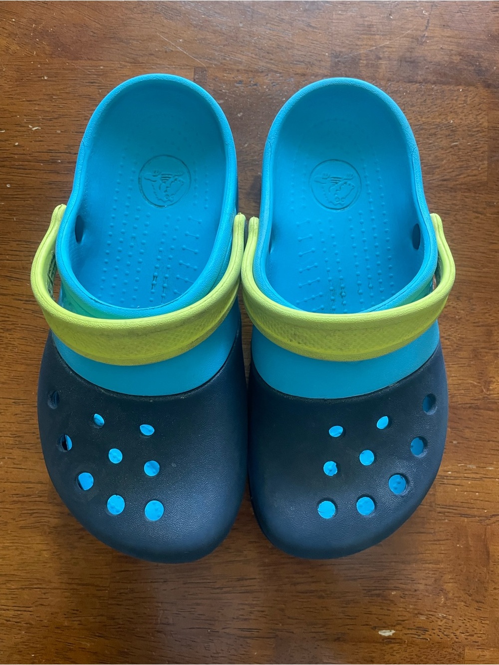 CROCS Kids Blue and Black Clogs with Neon Yellow Strap